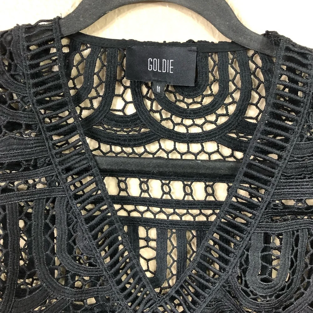 Goldie crocheted lace v neck flare sleeve top.